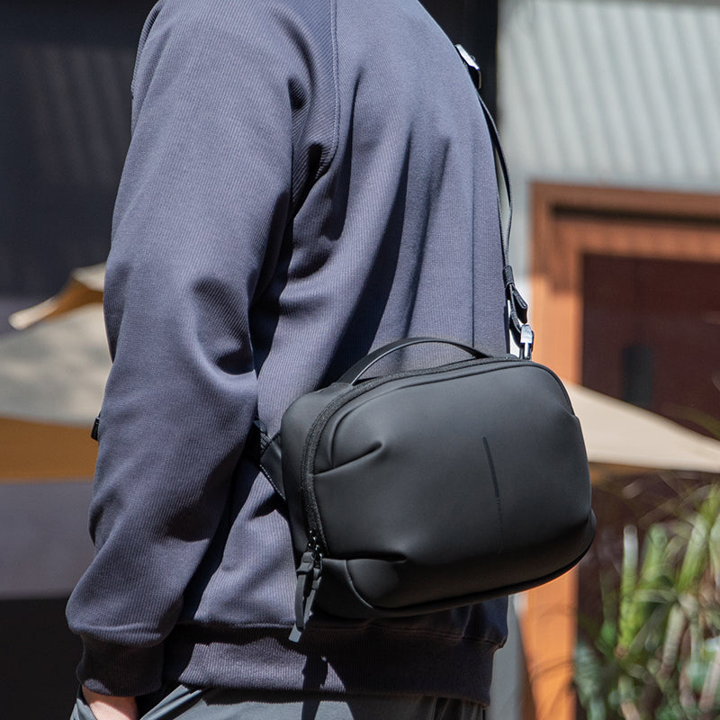 AquaLite: Waterproof PU Leather Sling Bag for the Modern Daily