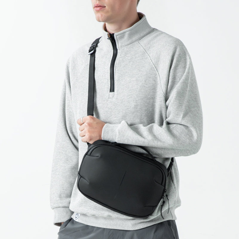 AquaLite: Waterproof PU Leather Sling Bag for the Modern Daily