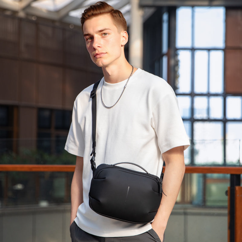 AquaLite: Waterproof PU Leather Sling Bag for the Modern Daily