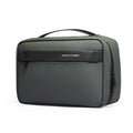 Dark green and black Mark Ryden compact washbag with multi-layer design, large capacity, zippered compartments, and top handle.